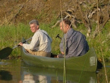 Exploring and sightseeing the shores of Pongola dam with a canoe Exploring and sightseeing the shores of Pongola dam with a canoe