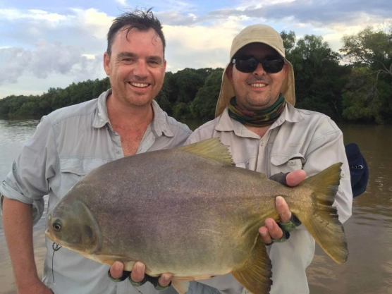 Tommy and Sebastian with Pacú Tommy and Sebastian with Pacú